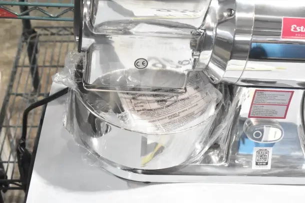 BRAND NEW Estella CG112NB electric hard cheese grater, 3.3 lb/min capacity, minor cosmetic dents, 110V, 1-phase.
