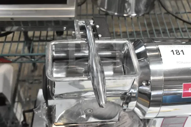 BRAND NEW Estella CG112NB electric cheese grater, 3.3 lb/min, 110 volts. Scratch and dent model in stainless steel.