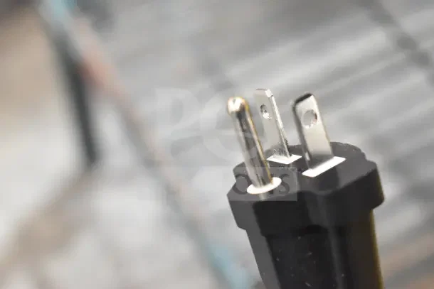 Close-up of a power plug for the RiceMaster Town 57155 rice cooker, suitable for 230 volts, 1 phase.