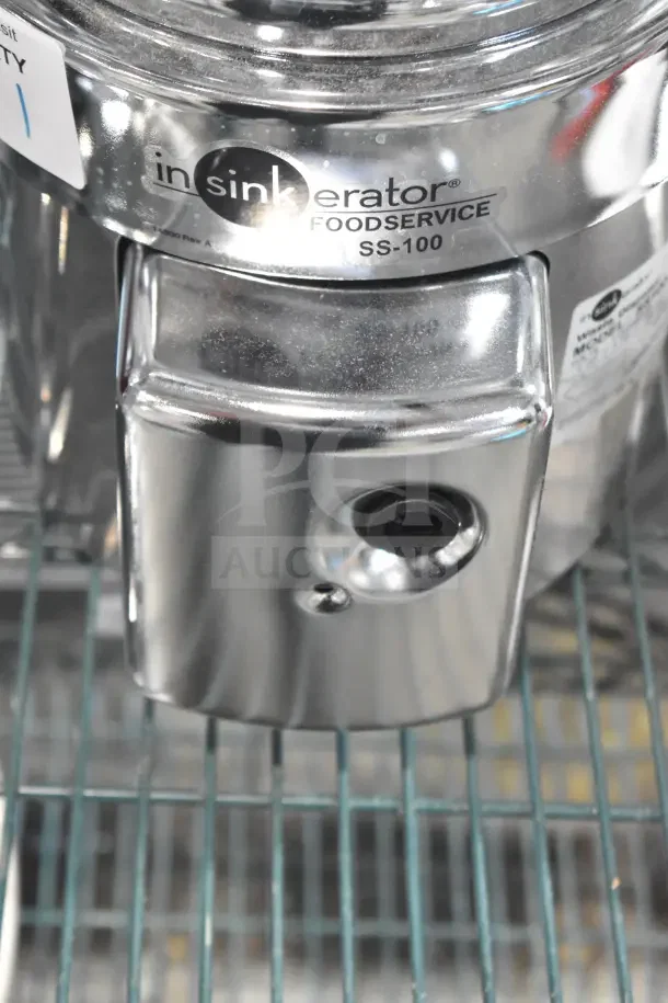 BRAND NEW SCRATCH AND DENT InSinkErator SS-100-28 commercial garbage disposer, shiny metal, 115/208/230V, 1 Phase.