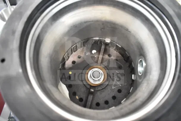 BRAND NEW InSinkErator SS-100-28 Commercial Garbage Disposer, 1 Phase, visible internal mechanism, minor scratches.