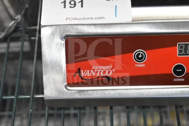 Brand new Avantco 177IC3500 induction range, featuring digital controls and a stainless steel finish with visible branding.