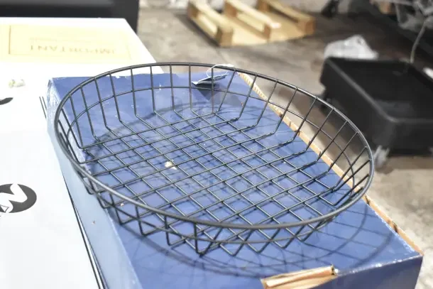 Black round wire basket by American Metalcraft, model WIB120, 12"x2". New, scratch and dent condition.