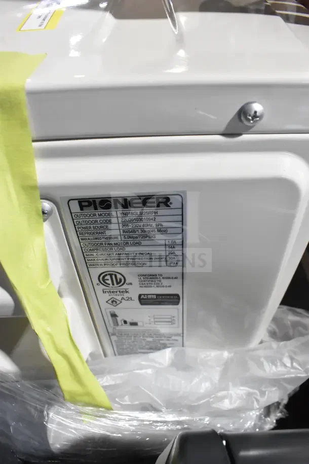 BRAND NEW Pioneer YN018GLSI25RPH 18,000 BTU ductless mini-split AC. Energy-Star, 23.5 SEER2. Scratch and dent condition. Labels visible.