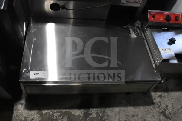 Brand new Avantco BW48 stainless steel hot dog bun warmer, 48", 120V, 600W, scratch and dent, tag shows item 202, qty 1.