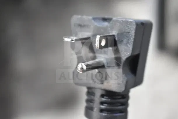 Plug close-up of a 2025 Avantco F202 dual tank electric countertop fryer, 208-240V, new with minor scratches.
