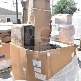 Large cardboard box containing 3 brand new scratch and dent items, including a Waterloo undermount sink and a dunnage rack. Labels visible.