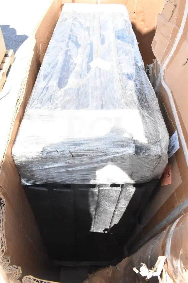 Three brand new items in original packaging, including a sink and a dunnage rack, visible cardboard and protective wrap.