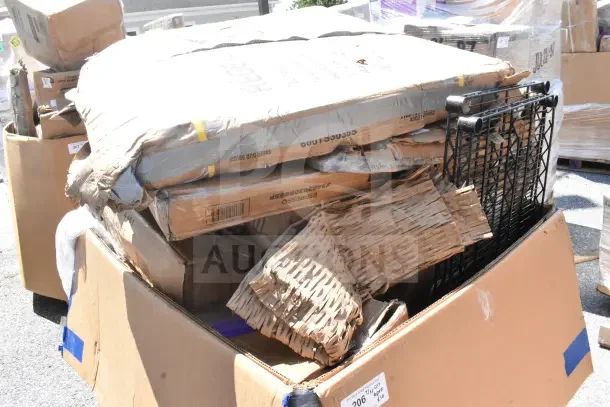 10 brand new scratch and dent items in boxes, including work table, wire shelf, evaporator coil. Visible wear on packaging.