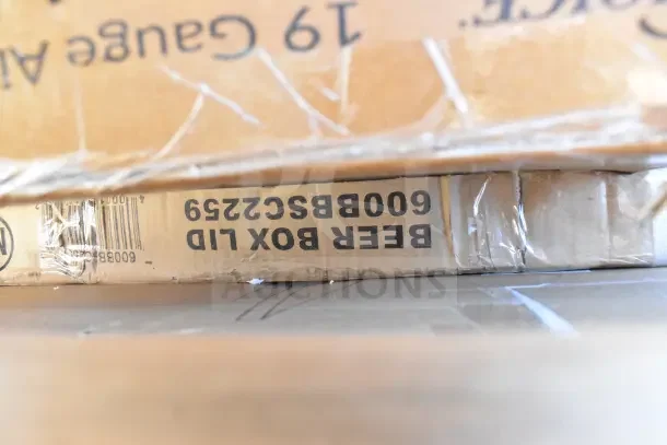 Cardboard box labeled "Beer Box Lid" with model 6008BSC2259, part of a scratch and dent auction lot.