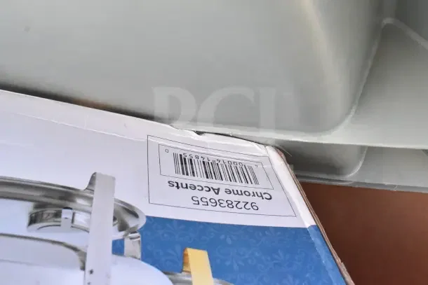 10 brand new scratch and dent items. Includes Ashland grease trap, work table, chafers. Box shows barcode and "Chrome Accents."