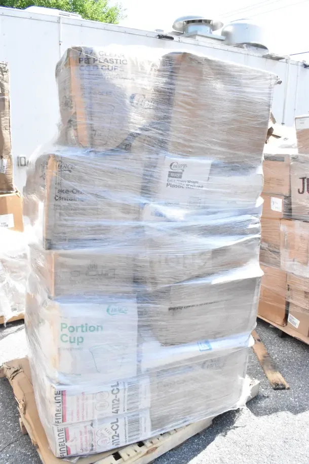 Pallet with 30 boxes of new "scratch and dent" cold cups, plates, portion cups, hot cups; visible brand labels, shrink-wrapped.