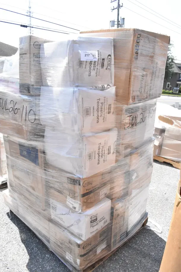 Pallet of 32 brand new scratch and dent boxes containing forks, lids, containers, and teaspoons, packaged in plastic wrap.