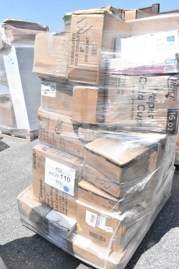 Pallet of 32 scratch and dent items, including forks, lids, containers. Various boxes wrapped in plastic, marked JUL26-110.