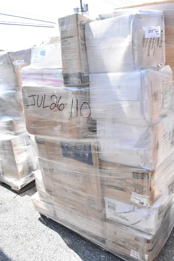 Shrink-wrapped pallet of 32 new scratch and dent items including boxes labeled forks, lids, containers. Marked "JUL26-110".