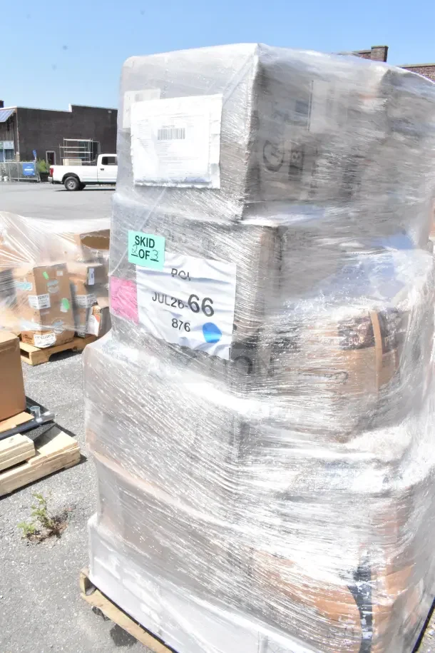 Plastic-wrapped pallet containing 24 new scratch and dent items: food trays, plates, foam cups, and hot cups. Skid 2 of 3. Marked JUL26-66.