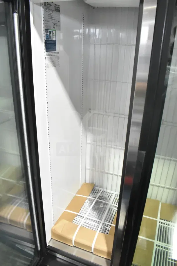 Brand new True GDM-35F-HC commercial reach-in freezer with 2 glass doors, scratch and dent condition, 115V, 1 phase.