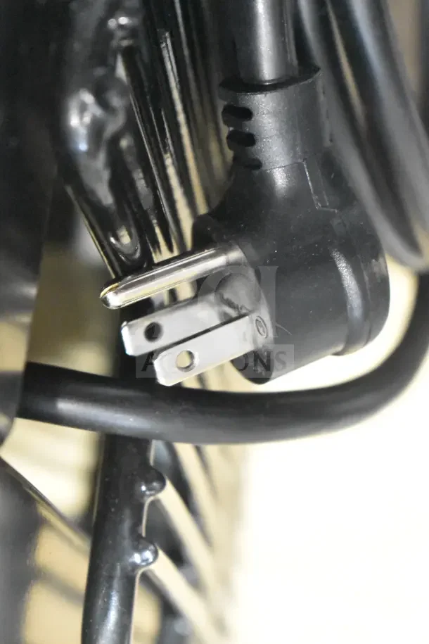 Alt text: Close-up of power plug for 2025 True GDM-35F-HC Commercial Freezer, 115 volts, 1 phase.