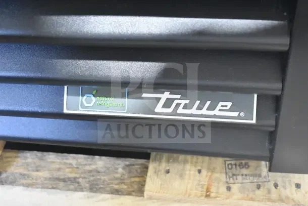 True GDM-35F-HC logo on a brand new commercial 2-door freezer with natural refrigerant label, 115V, 1-phase.