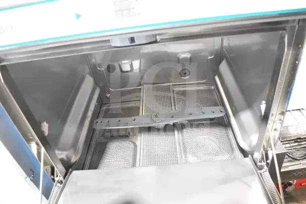 Brand new Noble 495LTUC24 low-temp undercounter dishwasher, 120V, 1 Phase, scratch and dent condition, interior view.