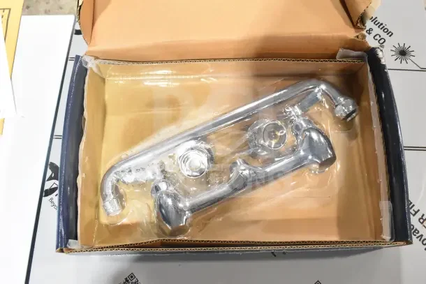 Brand new Waterloo 750FW814 wall-mounted faucet, 8" centers, 14" swing spout, scratch and dent condition, boxed.