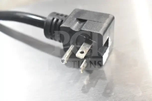 Close-up of a power plug for the Avantco 184T140 Conveyor Toaster, 120V, showcasing brand new condition.