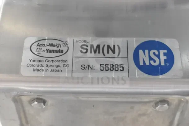 Yamato Accu-Weigh SM(N) dial scale label showing model, serial number 56885, and NSF certification. Made in Japan.
