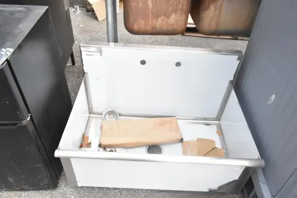 Brand new Regency 600S13621SB 36" utility sink, one compartment, 36" x 21" x 13" bowl, scratch and dent condition.