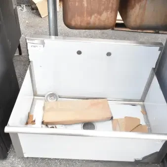 Brand new Regency 600S13621SB 36" utility sink, one compartment, 36" x 21" x 13" bowl, scratch and dent condition.