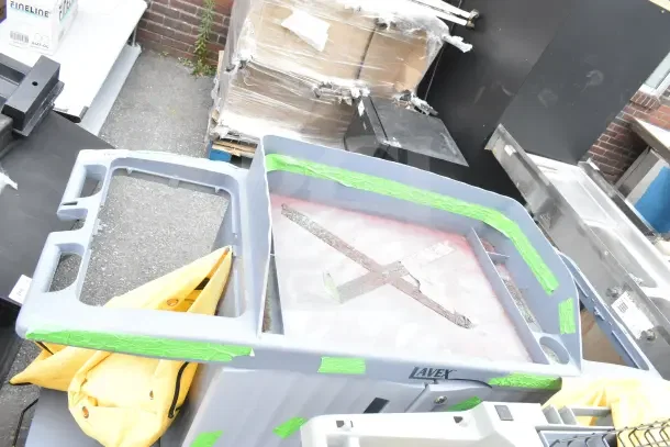 Lavex janitorial cart, gray, brand new condition with minor scratches and dents, green tape showing labels.