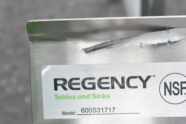 Regency 600S31717 label on commercial sink, shows brand and model. Brand new, scratch and dent condition.