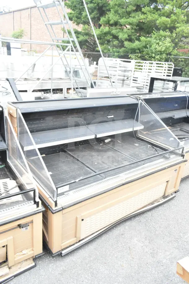 Killion Commercial Open Merchandiser in used condition. Beige, glass doors, two shelves, 120/208-240V. Some wear visible.