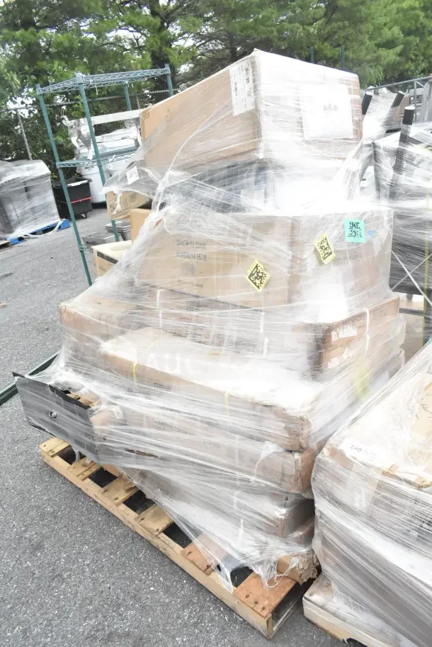 19 new scratch and dent items on pallet, including work table and sink. Wrapped in plastic, labeled with codes.
