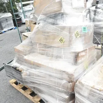 19 new scratch and dent items on pallet, including work table and sink. Wrapped in plastic, labeled with codes.
