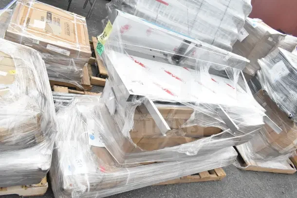 12 new scratch and dent items including wire shelf, evaporator coil. Items wrapped on pallets, ready for auction.