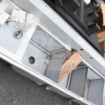 Brand new Steelton 522CS31818LR 90" commercial sink with three compartments, two 18" drainboards, minor scratches visible.