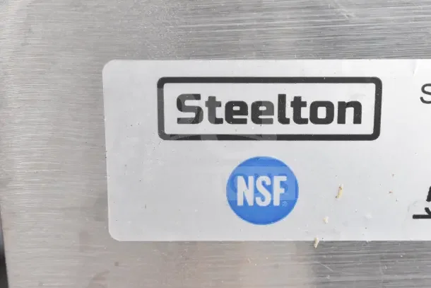Steelton 522CS31818LR commercial sink label with NSF certification, indicating quality and safety compliance.