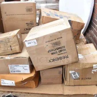 Boxes of scratch and dent items, including sinks, various brands visible, new condition, labels showing item specs and origin.