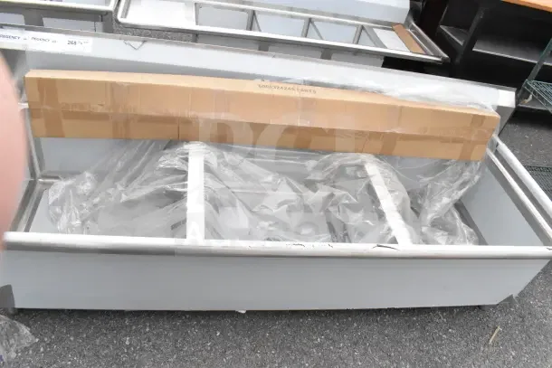 Brand new Regency 600S32424S 72" utility sink; three 24"x24"x14" compartments; slight scratches; commercial use.