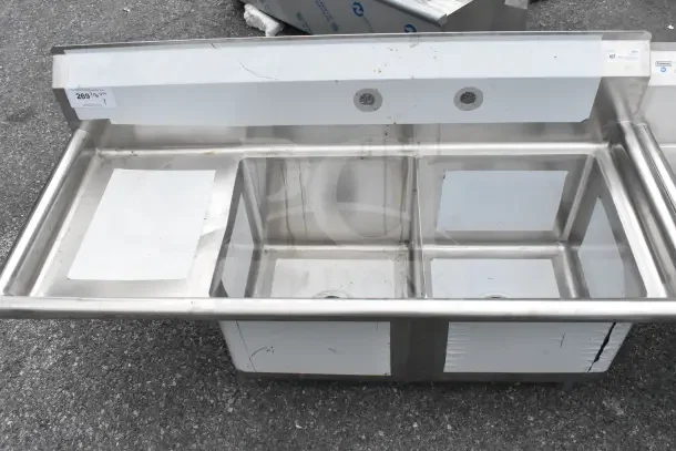 Brand new KoolMore SB151512-15L3 stainless steel 48" sink, two compartments, 2 drainboards, scratch and dent, no legs.