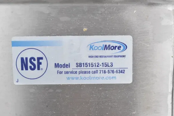 NSF and KoolMore labels on stainless steel surface, model SB151512-15L3, contact info and website visible.