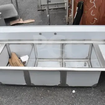 Brand new Steelton 522CS31620LR commercial 3 bay sink with dual drain boards, showing minor scratches and dents.