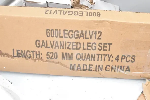 Cardboard packaging for Steelton 522CS31620LR sink leg set. Text: "600LEGGALV12 Galvanized Leg Set, Length: 520mm, Quantity: 4 pcs, Made in China."