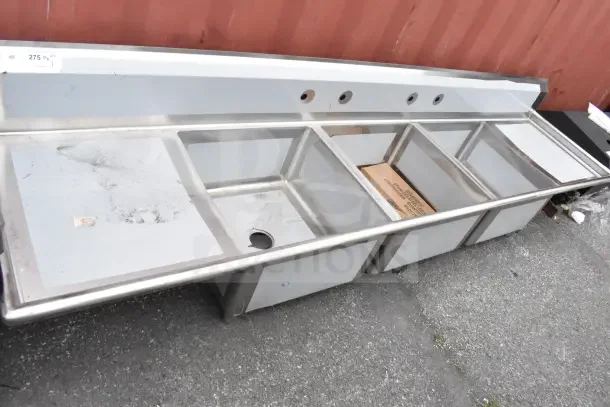 BRAND NEW Regency 121" three-compartment commercial sink with galvanized steel legs, two 24" drainboards, minor scratches.