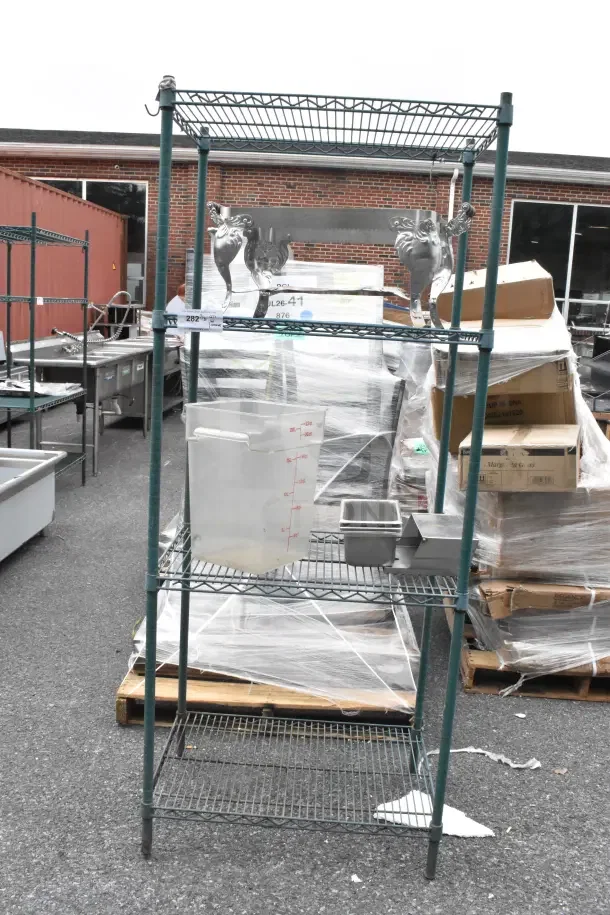 Green finish 4-tier wire shelving unit, sturdy design, good condition. Buyer must dismantle. Consider freight charges.