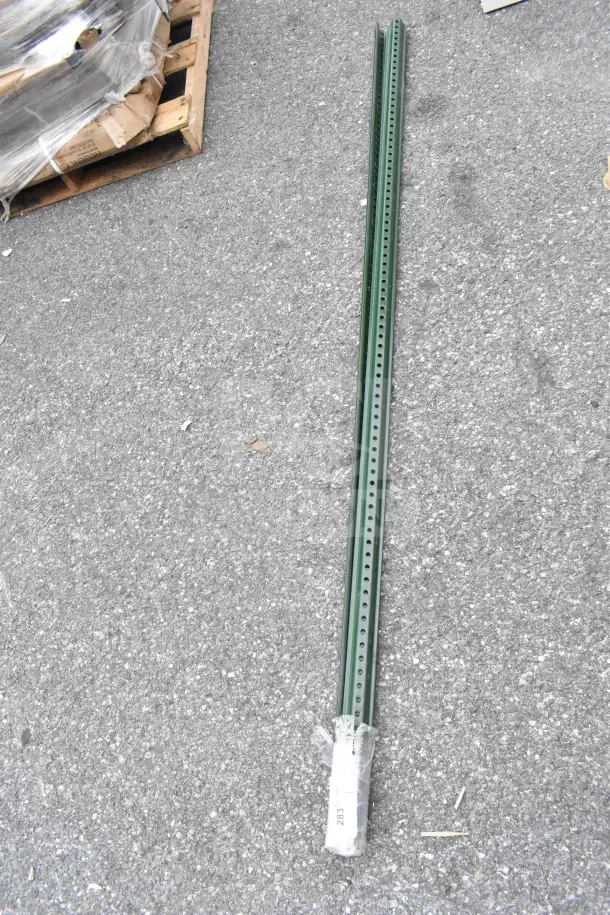 Lot of 5 green metal posts with perforated holes, bundled together. Suitable for signs or fencing. Good condition.