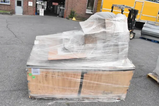 Regency 72" three-compartment commercial utility sink, brand new, scratch and dent. Wrapped in plastic on a wooden pallet.