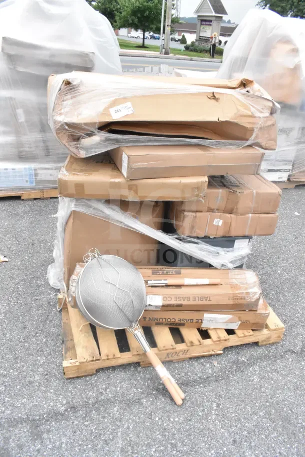 Pallet of boxed Regency 72" three compartment sinks, wrapped in plastic. Some boxes show minor damage.