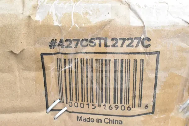 Cardboard packaging with #427CSTL2727C barcode and "Made in China" label for Regency utility sink auction.