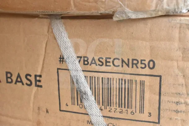 Cardboard box with barcode and #47BASECNR50 text, containing 12 brand new, scratch and dent Regency utility sinks.